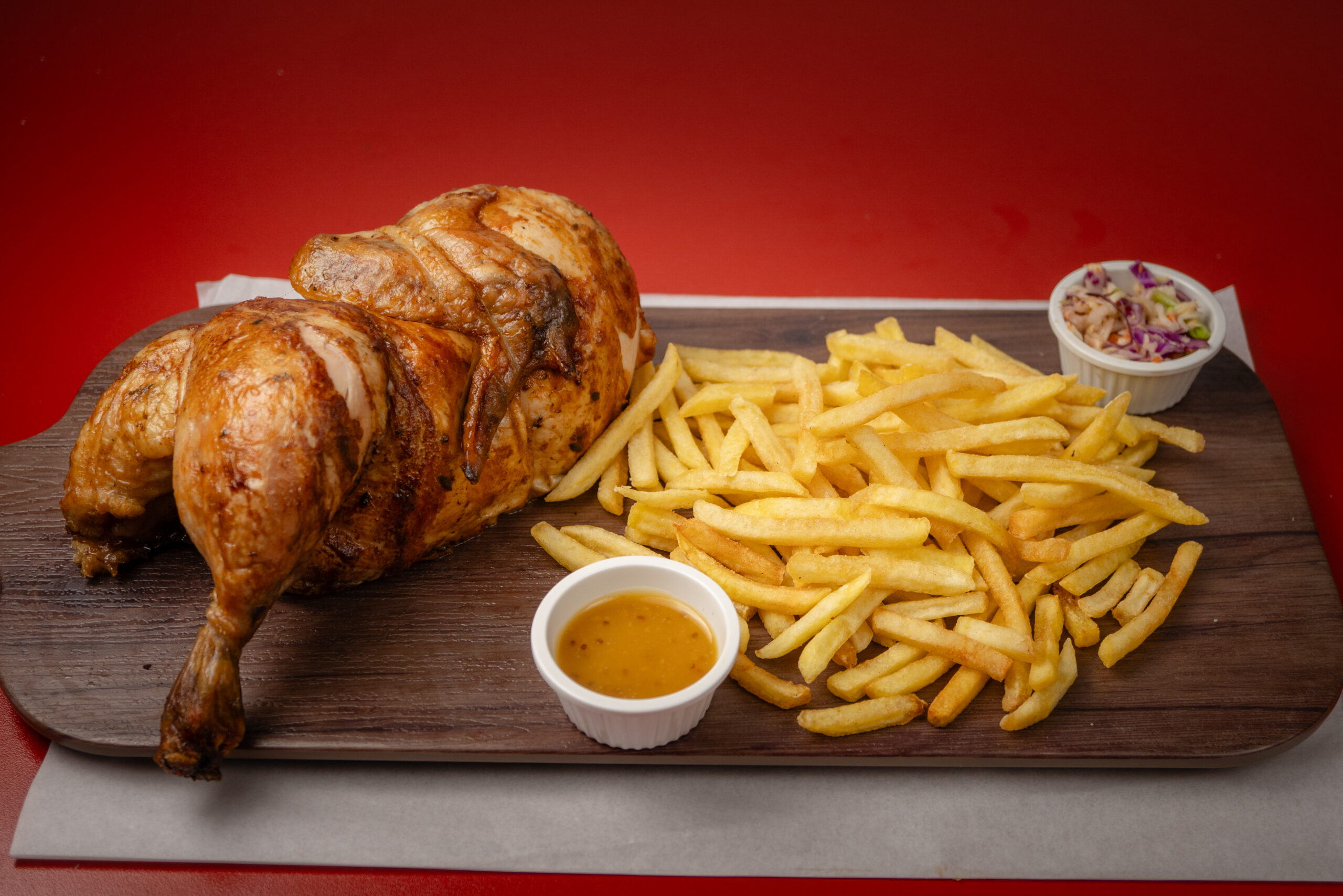 Promo 2: 1 pollo asado a las brasas 1 papas fritas grande 12 empanaditas de queso 10 chicken pop.